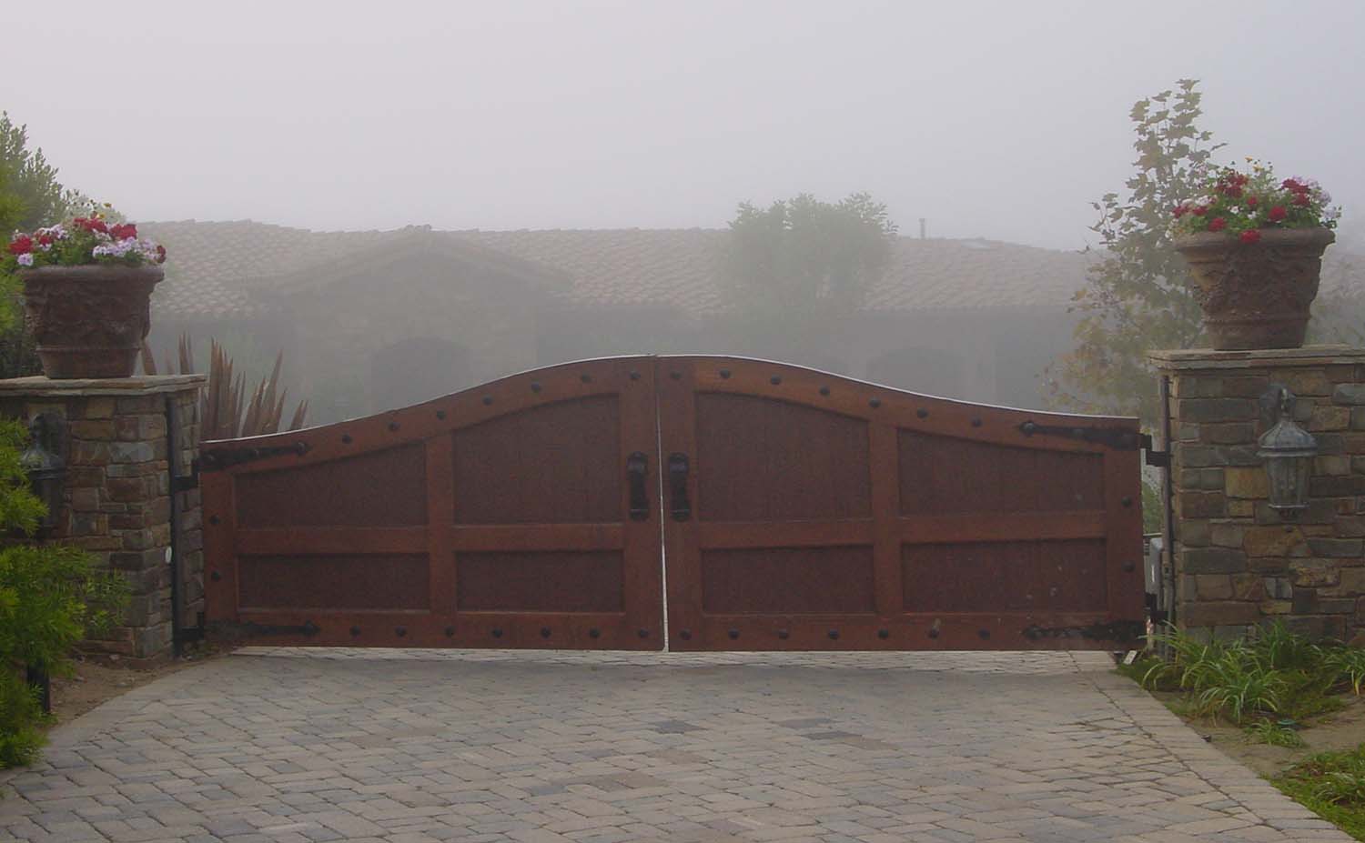Drive Gates made from red cedar, clear heart redwood, mahogany,