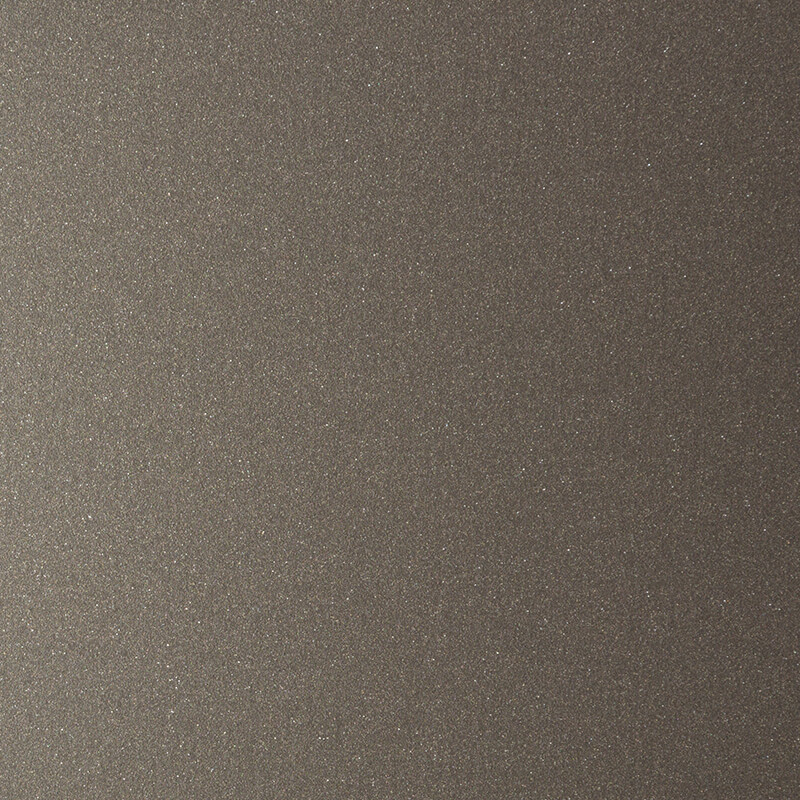 Brown textured surface with a subtle, fine, and even distribution of sparkling or glitter-like particles, creating a shimmery and metallic appearance across the entire image.