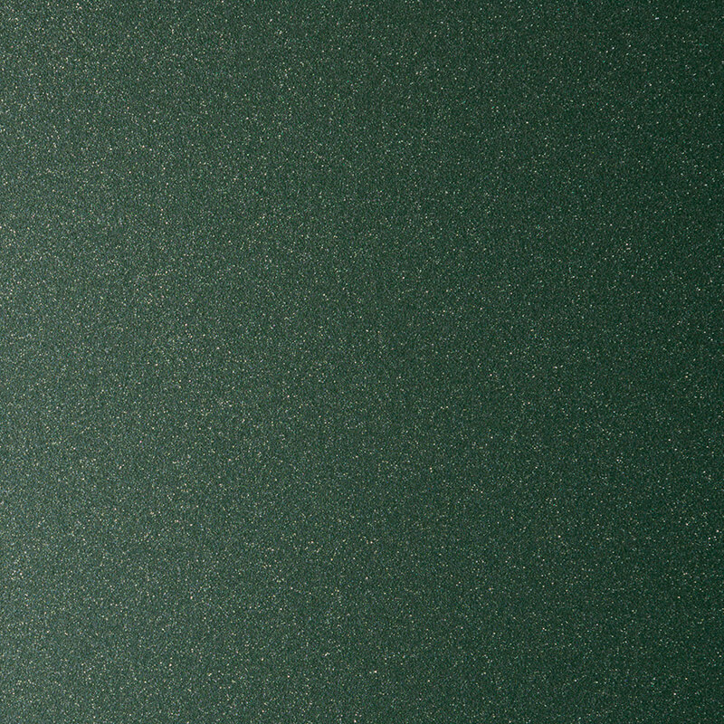 A close-up view of a dark green, glittery surface with a subtle shimmer and fine textured specks, creating a sparkling effect across the entire image.