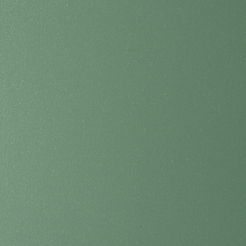 A smooth, evenly textured green surface with a subtle, fine-grain shimmer throughout.