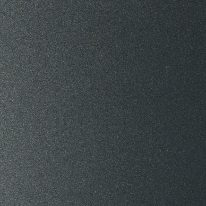 Dark, smooth, and slightly textured surface with a subtle metallic sheen, featuring a gradient from deep charcoal gray to lighter gray tones.