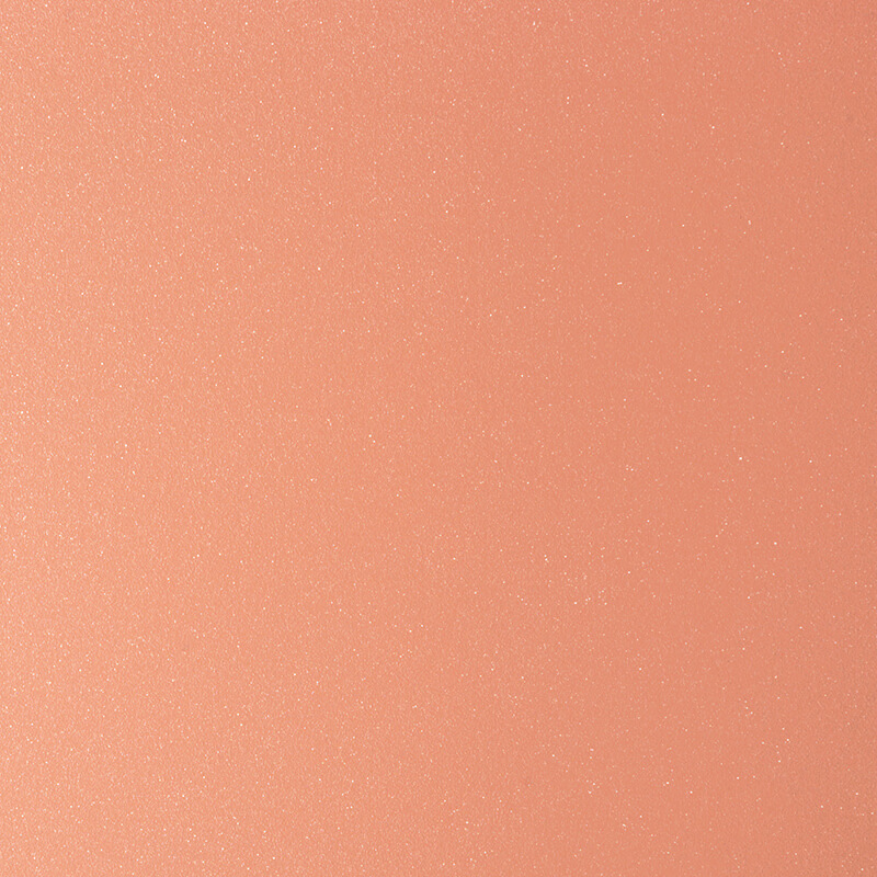 A close-up image of a smooth, peach-colored surface with a subtle, fine texture and a slight shimmer, evenly lit with no distinct patterns or objects visible.