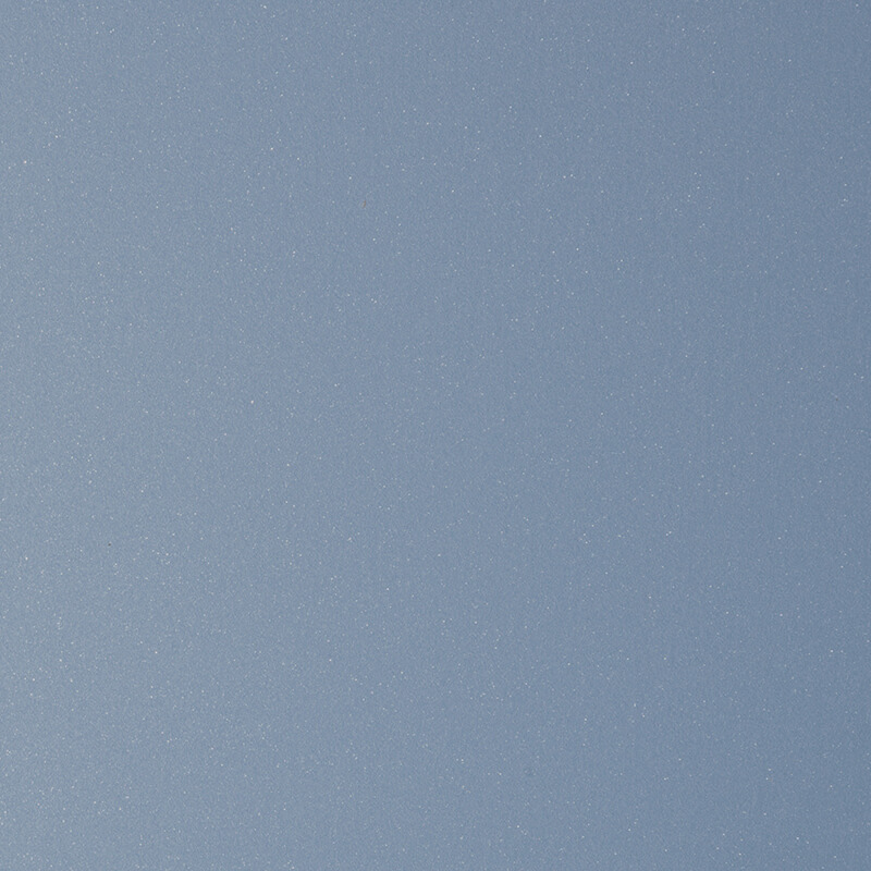 A smooth, light blue surface with a subtle, fine texture that gives it a slightly shimmery or glittery appearance.