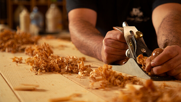 Man using hand tools to build garage door man using hand tools to build garage door