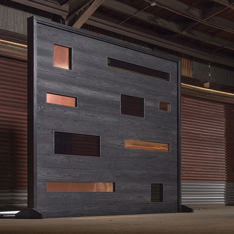Contemporary-collection-kasai-door Contemporary Collection Garage Door that is ade from farmed Norwegian-sourced wood, which is then waterproofed via the traditional Japanese shou sugi ban process,